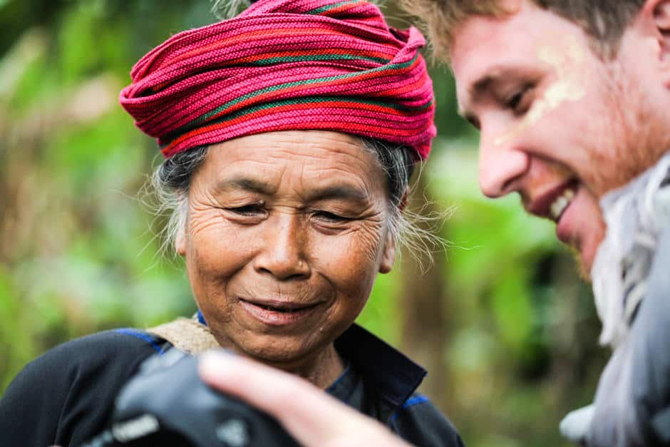 showing photo preview to a Burmese woman