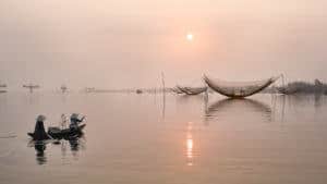 Boat on a river in Vietnam at sunrise
