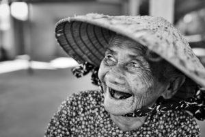 Old Vietnamese woman laughing