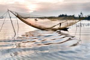 A big fishing net on the river in Vietnam