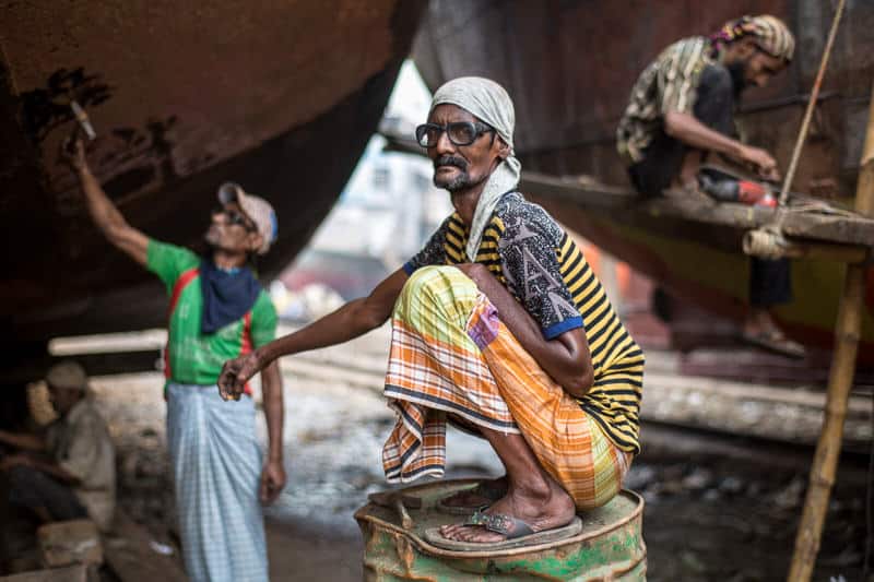 Man working on a shipyard in Dhaka