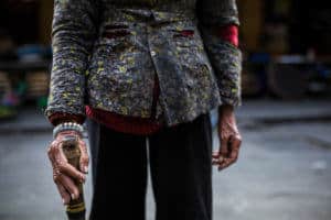 Creative travel photo composition featuring a local in Hoi An, Vietnam