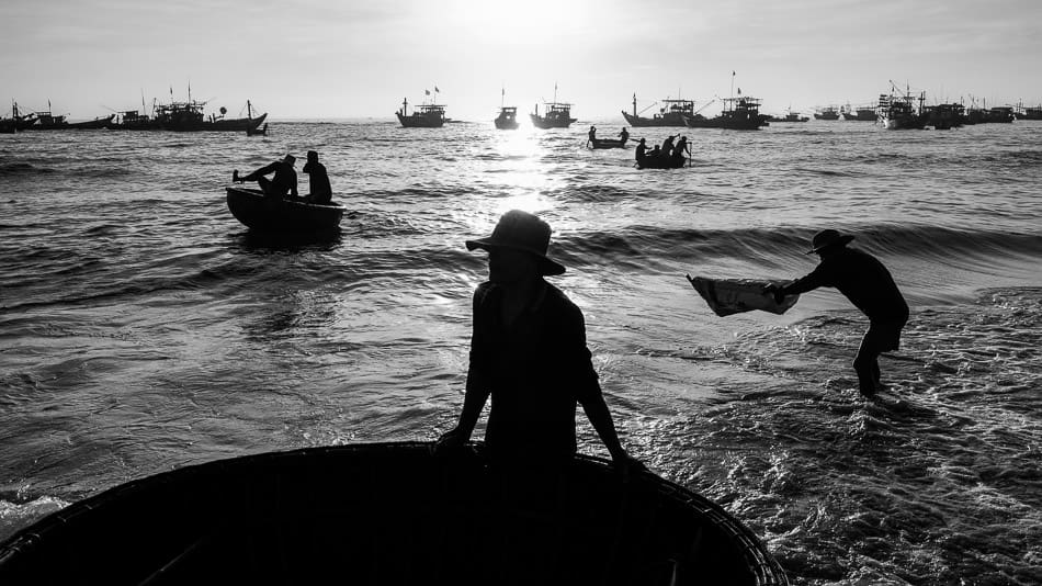 Black and white image of early morning fishing in Central Vietnam