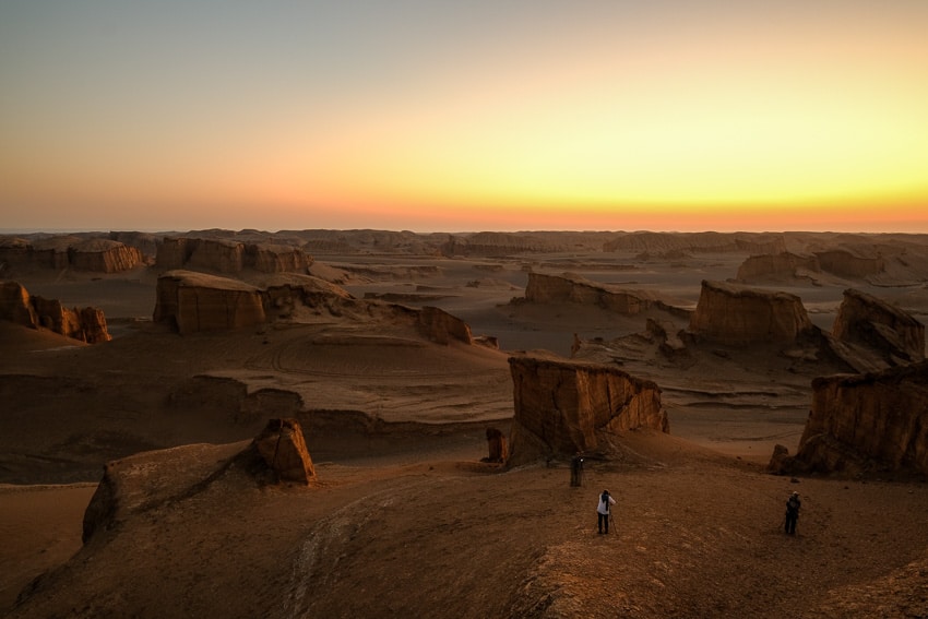 Our photography tour group during a sunrise session in the kalouts desert of Iran