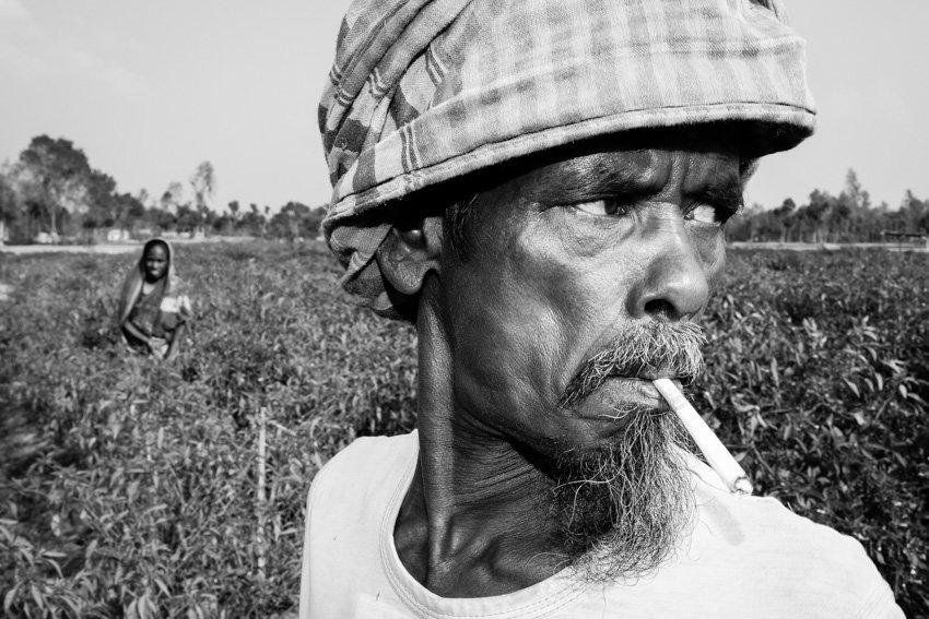 Portrait with flash of a chili farmer in Bangladesh