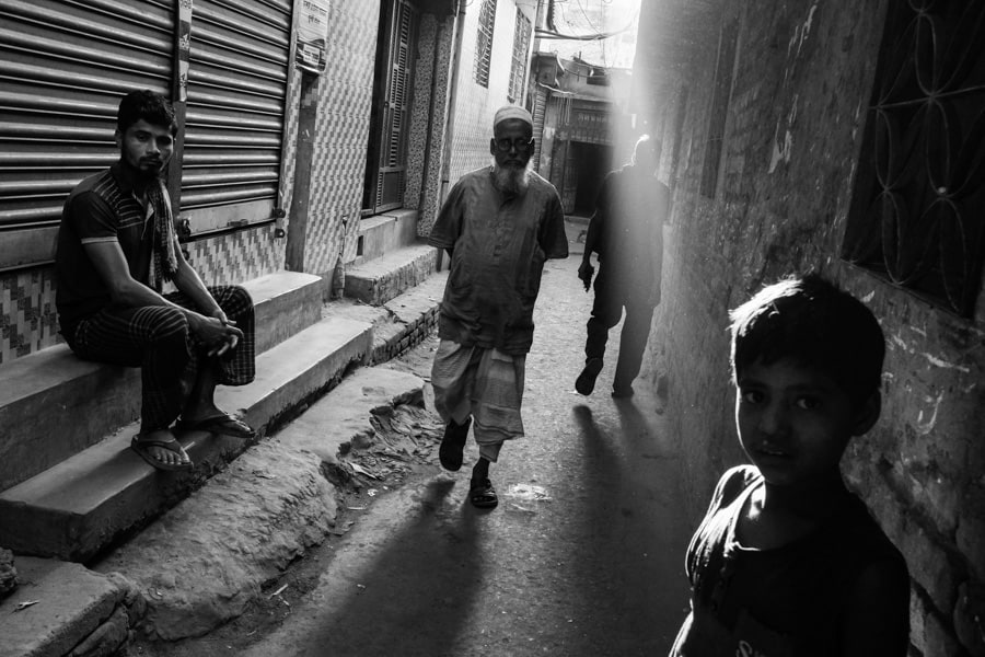 people walking in the streets of old Dhaka in Bangladesh