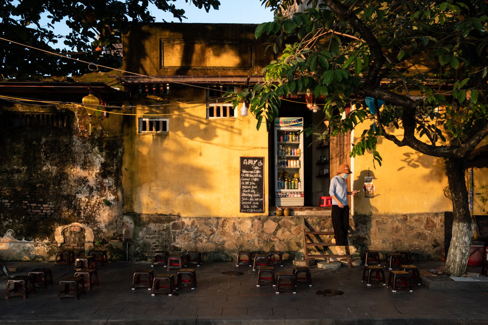 Woman in her shop in Hoi An old town on a photography tour