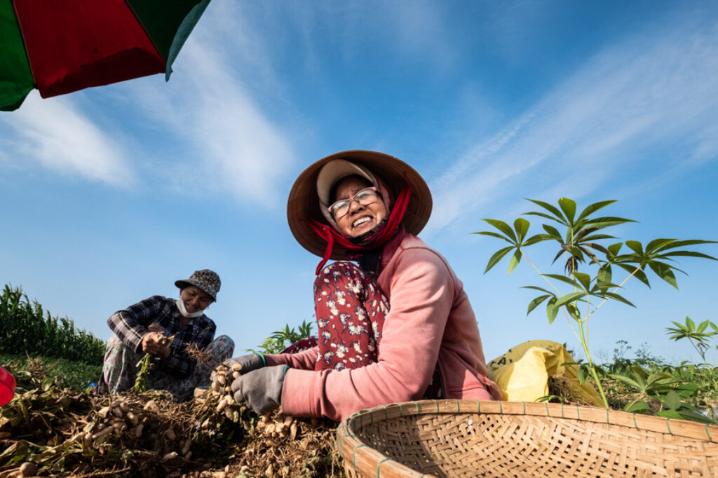 using dramatic background to take photos of people in Vietnam with Pics of Asia