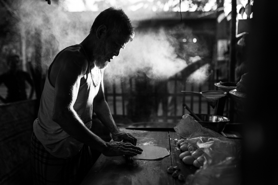 A man making bread in his shop in Jaflong