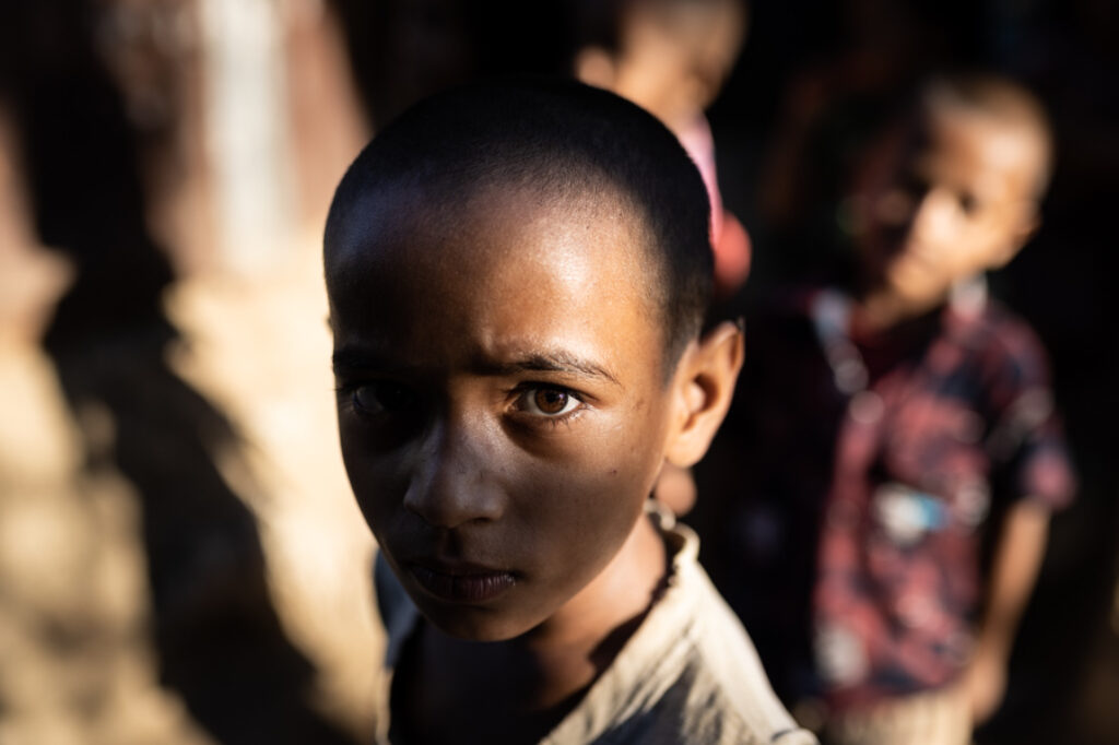 A boy looking at the camera in Bangladesh on a photo tour with Pics of Asia